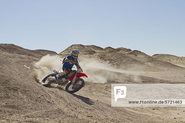 USA  California  Motocrosser performing power slide on Palm Desert
