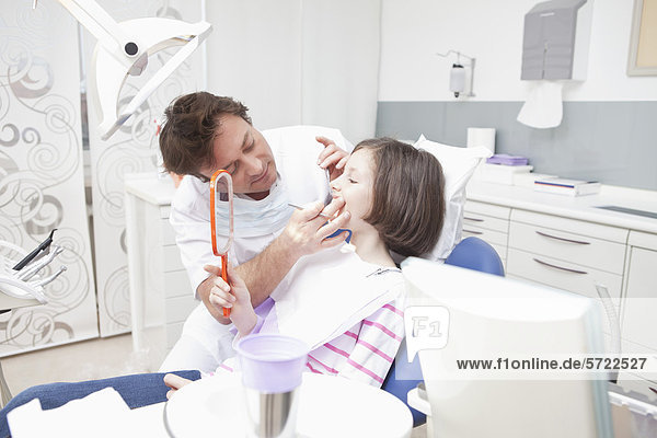 Germany  Bavaria  Dentist examining patient