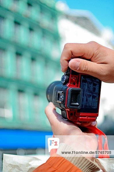 Male using a Panasonic Lumix camera