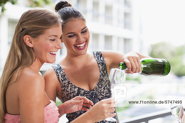 Women drinking champagne together