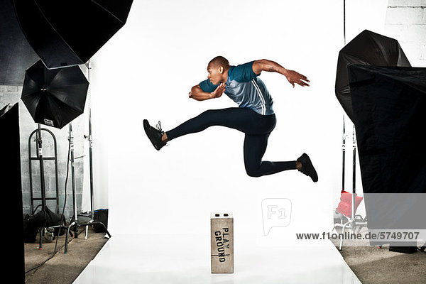 Athlete at photo shoot jumping