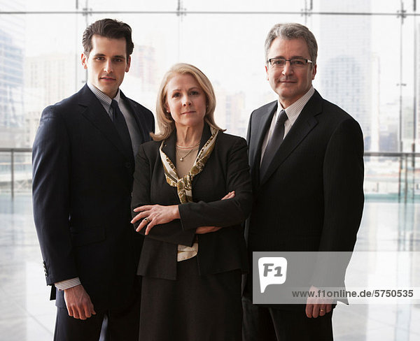 Three business colleagues standing together  portrait