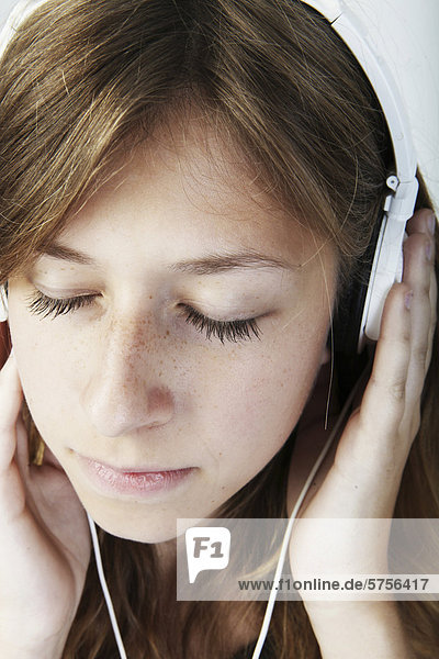 Young woman wearing headphones  portrait