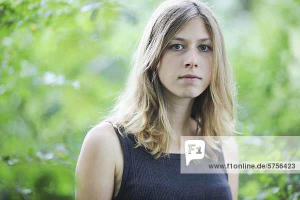 Young woman  portrait  outdoors  in nature