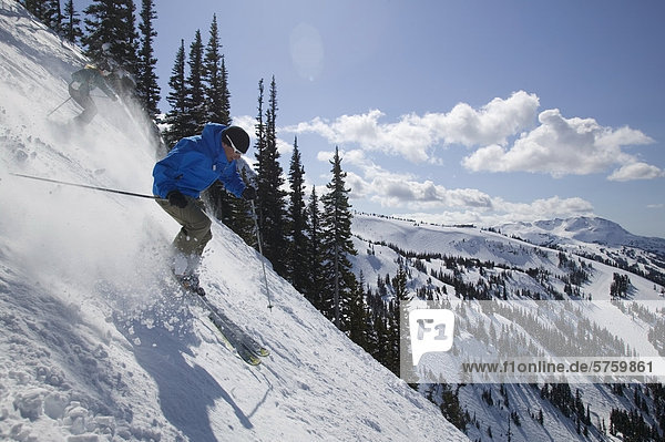 Man downhill skiing  Whistler  British Columbia  Canada.