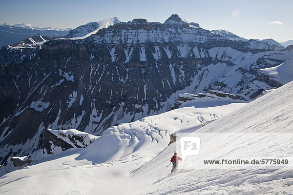 A man descends Mt Stanley Northface on telemark skis  Kootenay National Park  British Columbia  Canada