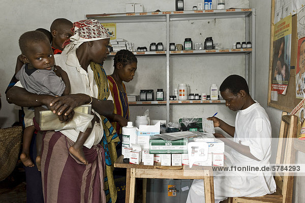HIV-positive mother with her child at the dispensary for anti-viral drugs in a clinic in Quelimane  Mozambique  Africa