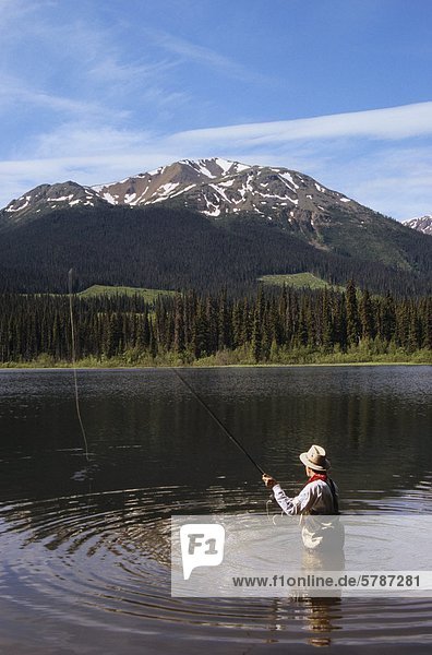 Flyfisherman on Dennis Lake  Bulkley Valley  British Columbia  Canada.