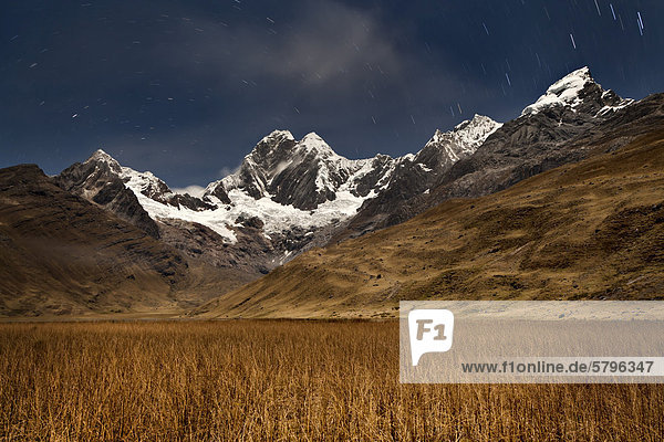 Star trails above Laguna Mitucocha  Nevado Jirishanca  Nevado Yerupaja  Cordillera Huayhuash  Peru  South America