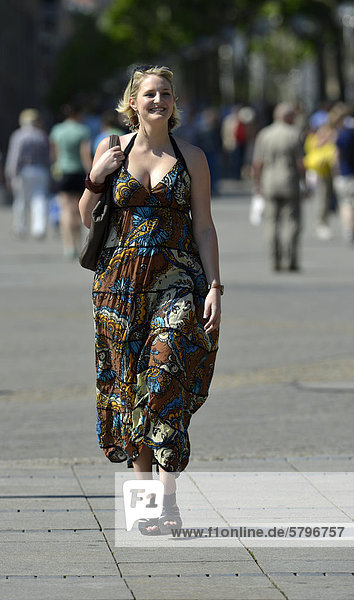 Young woman wearing a summer dress  Koenigsstrasse  Stuttgart  Baden-Wuerttemberg  Germany  Europe  PublicGround
