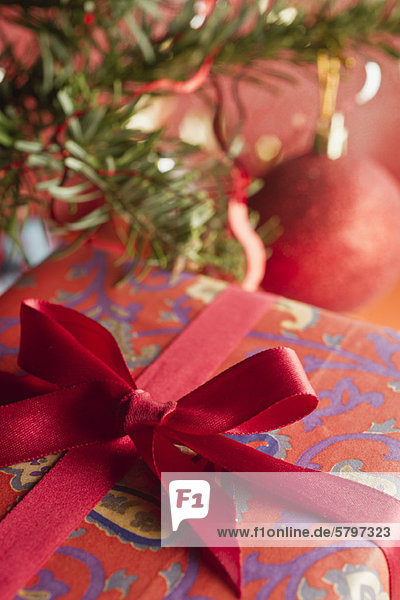 Festively wrapped Christmas gift  close-up