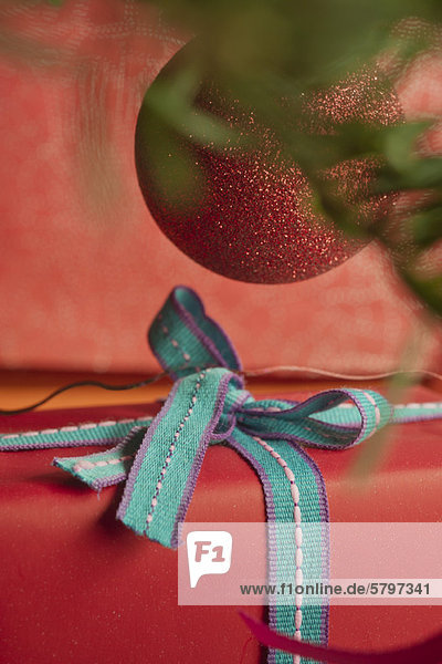Festively wrapped Christmas gift  close-up