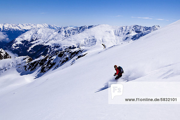 Female skier skiing on Zischgelesspitze mountain  Zischgeles mountain  Stubai Alps  northern Tyrol  Tyrol  Austria  Europe