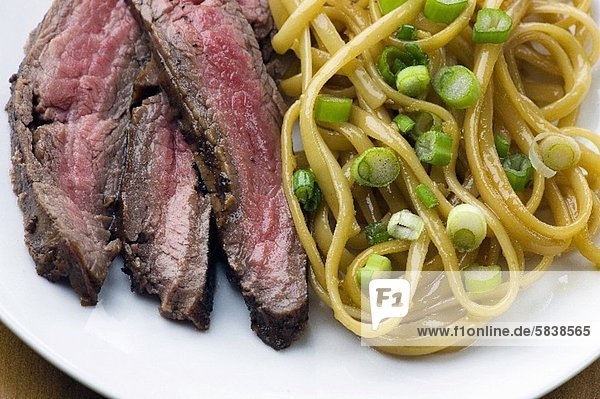 'Sliced Steak with Sesame Noodles with Scallions
