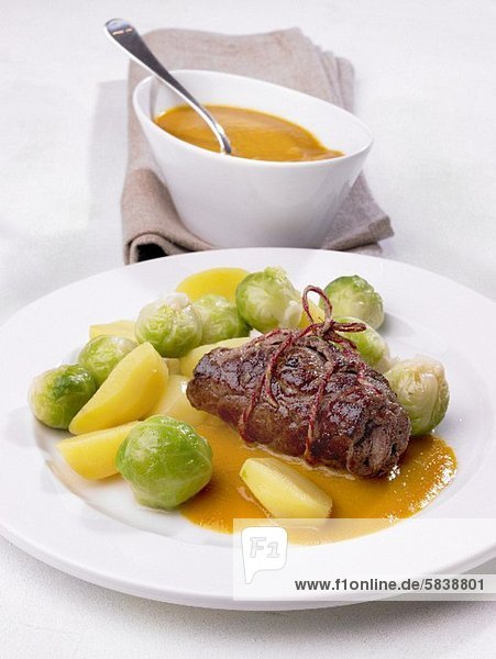 Beef roulade with Brussels sprouts and potatoes