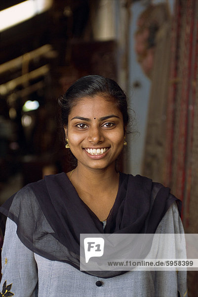 Portrait of a shop assistant inantique area of Jewtown  Fort Cochin  Kerala state  India  Asia