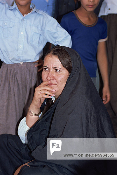 Head and shoulders portrait of a Kurdish woman at the Souk Erbil  Kurdistan  Iraq  Middle East