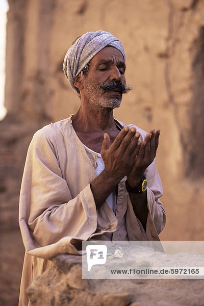 Man praying  St. Simeon monastery  Aswan  Egypt  North Africa  Africa
