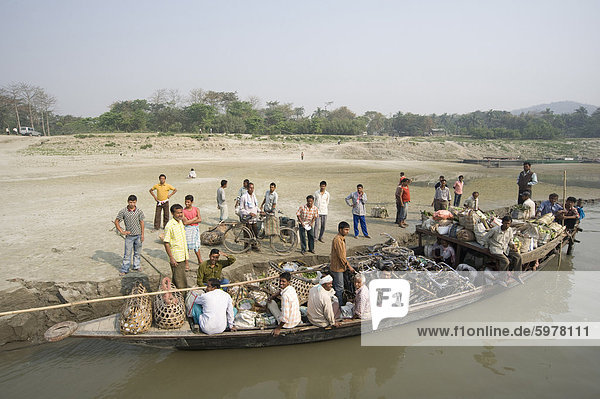 Ferry being loaded for journey across the Brahmaputra River  Assam  India  Asia
