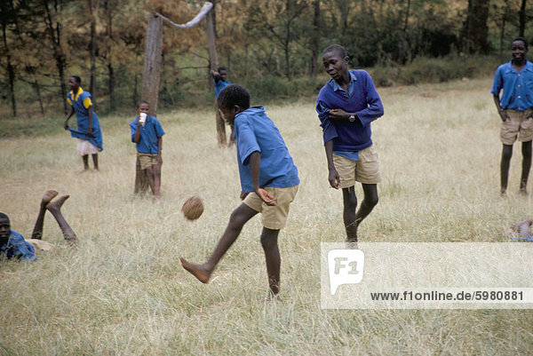 School children playing football  western area  Kenya  East Africa  Africa
