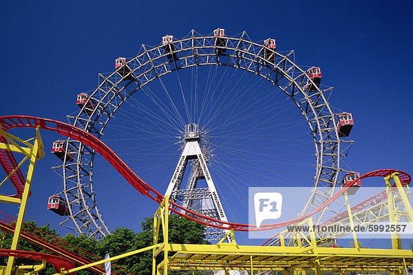 Big wheel with roller coaster  Prater  Vienna  Austria  Europe