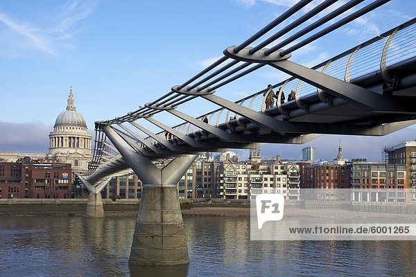 Pedestrians on Millennium Bridge  crossing the River Thames  taken from Bankside looking to St. Pauls Cathedral  London  England  United Kingdom  Europe