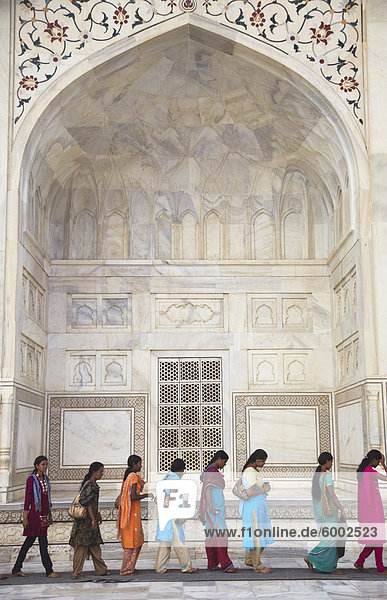 Indian women standing in line at Taj Mahal  UNESCO World Heritage Site  Agra  Uttar Pradesh  India  Asia