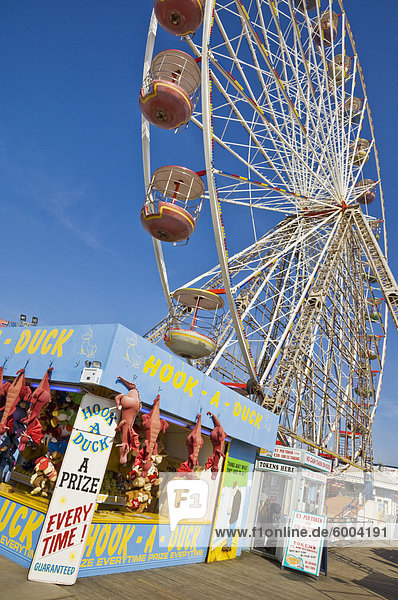 Big wheel and prize stall on the Central Pier  Blackpool  Lancashire  England  United Kingdom  Europe