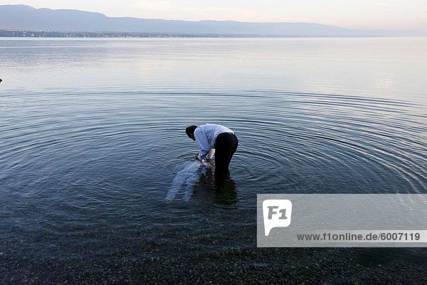 Taufe im Leman See  Genf  Schweiz  Europa