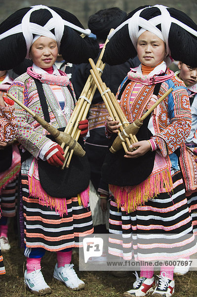Long Horn Miao women at lunar New Year festival celebrations in Sugao ethnic village  Guizhou Province  China  Asia