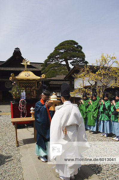 Priests in ritual procession at Takayama spring festival  Honshu Island  Japan  Asia