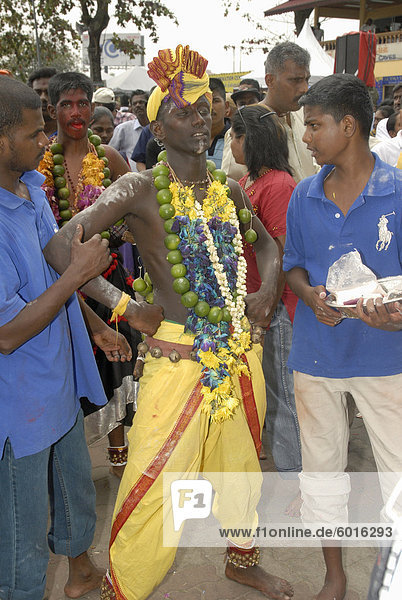 Pilgrim in trance during the Hindu Thaipusam Festival during walk from Sri Subramaniyar Swami Temple up to Batu Caves  Selangor  Malaysia  Southeast Asia  Asia