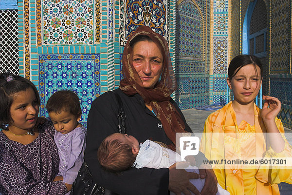 Woman and her children at shrine of Hazrat Ali  who as assassinated in 661  Mazar-I-Sharif  Afghanistan  Asia