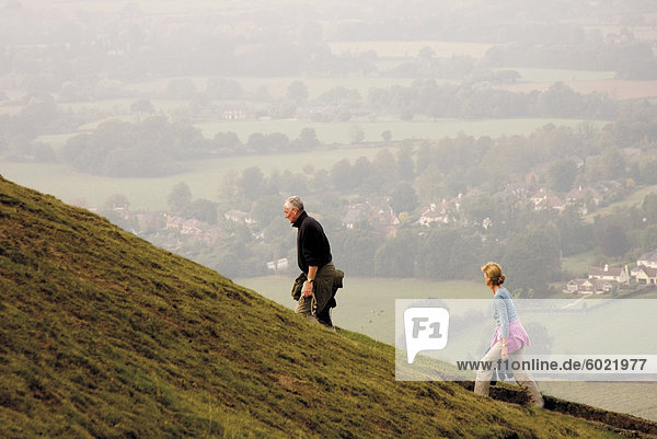 Couple walking  British Camp  Hereford Beacon  Malvern Hills  Herefordshire  Midlands  England  United Kingdom  Europe