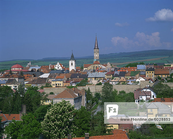 Houses and churches on the skyline of the town of Levoca  with countryside behind  in Slovakia  Europe