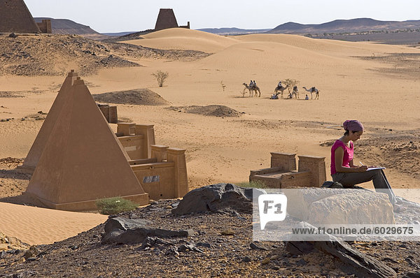 Tourist at the Pyramids of Meroe  Sudan  Africa