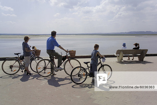 Family on bicycles  Le Crotoy  Somme Estuary  Picardy  France  Europe