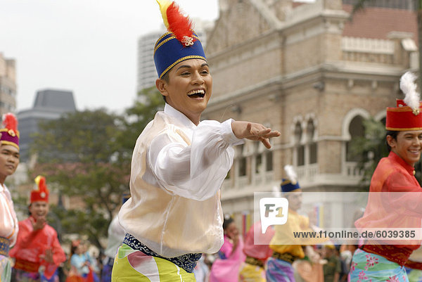 Malay female dancer wearing traditional dress at celebrations of Kuala Lumpur City Day Commemoration  Merdeka Square  Kuala Lumpur  Malaysia  Southeast Asia  Asia