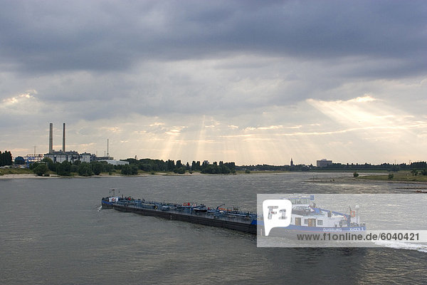 Cargo boat on the River Rhine  Dusseldorf  North Rhine Westphalia  Germany  Europe