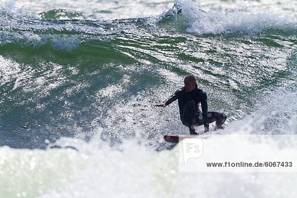Male surfer on wave