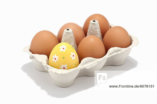 A box of eggs one decorated