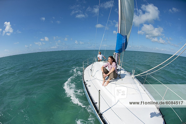A man and woman sailing off of Florida.