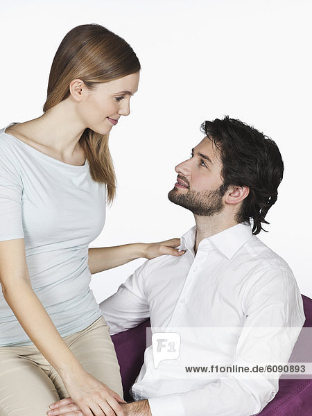 Young couple looking at each other  smiling
