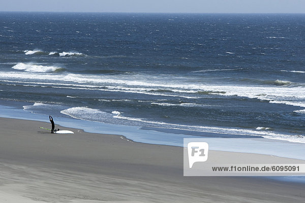 einsteigen  Mann  Strand  strecken  1  Windsurfing  surfen