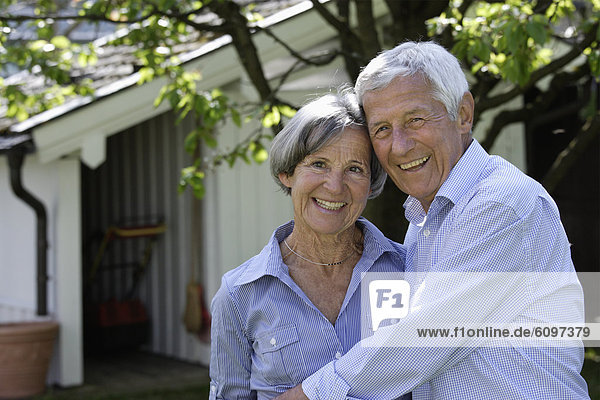 Germany  Bavaria  Senior couple smiling  portrait