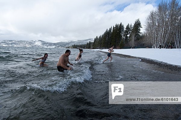 Starting the new year off with a tradition  a group of friends jump in the frigid lake in Incline Village  Nevada.