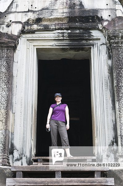 Woman traveller at Angkor Wat  Cambodia.