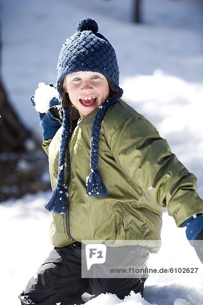 A boy plays in the snow in Lake Tahoe  California.