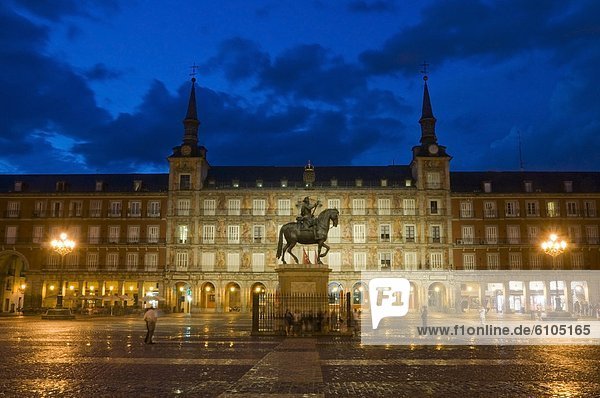 Plaza Mayor at dusk just after a rain storm in Madrid  Spain.