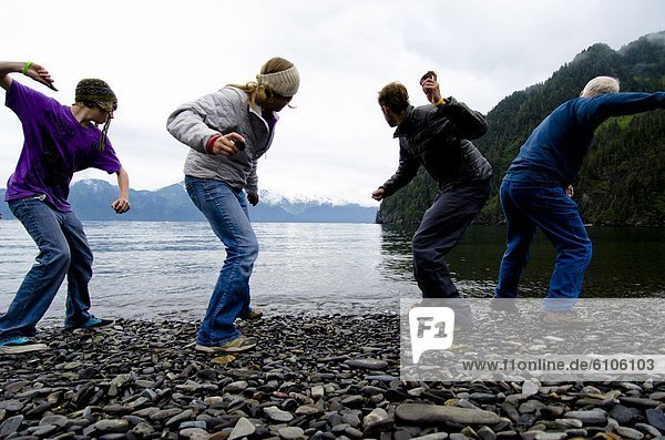 Ready  set  rock-skipping contest on Fox Island  Alaska.